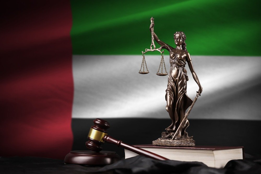 united-arab-emirates-flag-with-statue-lady-justice-constitution-judge-hammer-black-drapery-concept-judgement-guilt-1-1